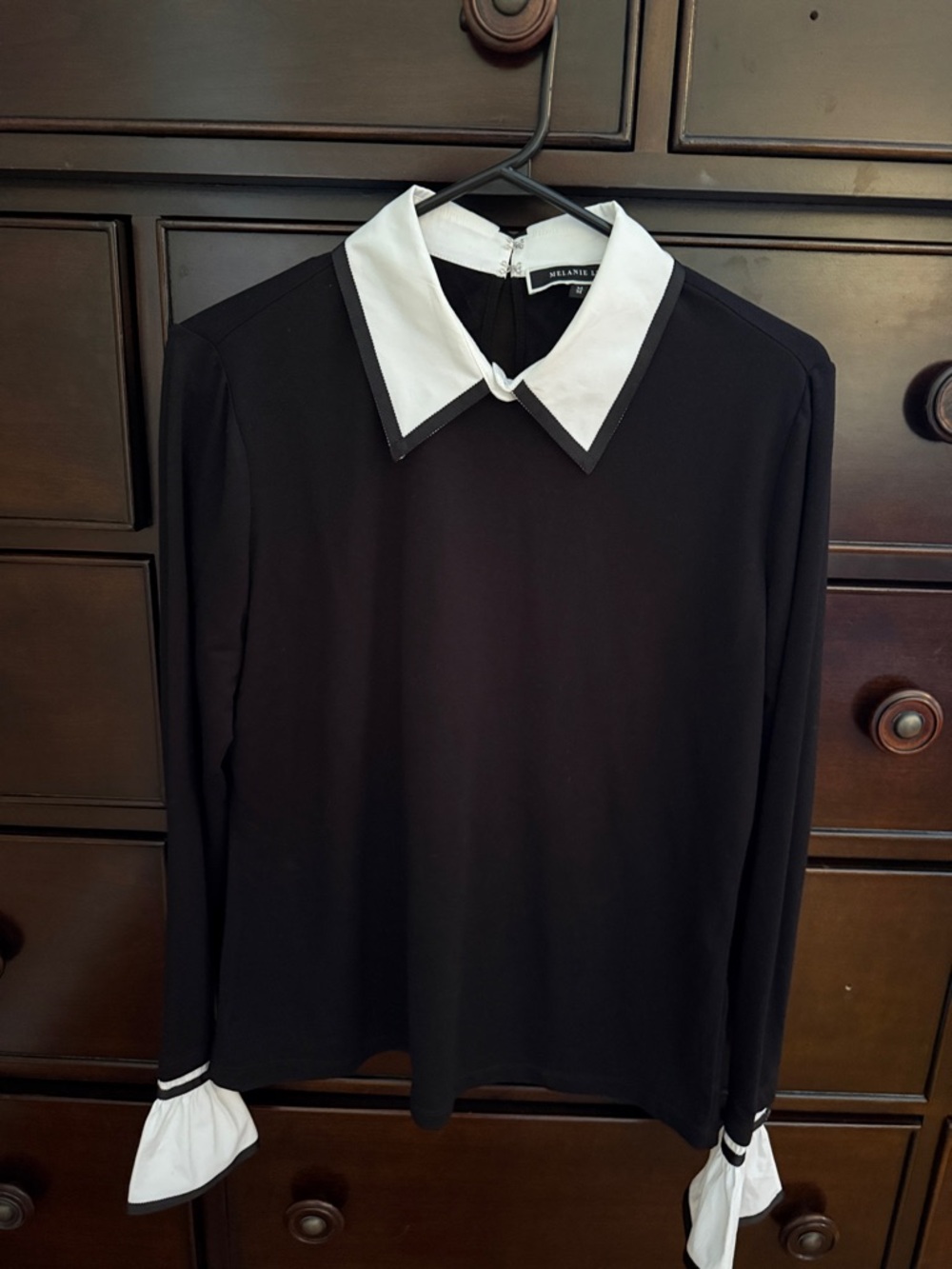 Black Long-Sleeve Blouse with White Contrast Collar and Cuffed Sleeves